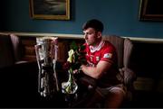 10 June 2025; Niall O'Leary of Cork poses for a portrait with the Liam MacCarthy cup during the national launch of the GAA Hurling All-Ireland Senior Championship Series at Kinnitty Castle in Offaly. Photo by Ray McManus/Sportsfile
