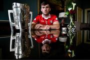 10 June 2025; Niall O'Leary of Cork poses for a portrait with the Liam MacCarthy cup during the national launch of the GAA Hurling All-Ireland Senior Championship Series at Kinnitty Castle in Offaly. Photo by Brendan Moran/Sportsfile