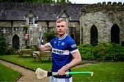 10 June 2025; Podge Delaney of Laois poses for a portrait with the Liam MacCarthy cup during the national launch of the GAA Hurling All-Ireland Senior Championship Series at Kinnitty Castle in Offaly. Photo by Brendan Moran/Sportsfile
