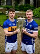 10 June 2025; Jake Morris of Tipperary, left, and Podge Delaney of Laois with the Liam MacCarthy cup during the national launch of the GAA Hurling All-Ireland Senior Championship Series at Kinnitty Castle in Offaly. Photo by Brendan Moran/Sportsfile