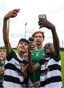10 June 2025; Cian Lynch of Limerick with Abdall Khan and Donald Ncube, pupils of St Brendan's National School, Birr, at the national launch of the GAA Hurling All-Ireland Senior Championship Series at GAA Faithful Fields Offaly Centre of Excellence, Kilcormac in Offaly. Photo by Ray McManus/Sportsfile