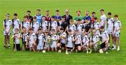 10 June 2025; Uachtarán Chumann Lúthchleas Gael Jarlath Burns with hurlers, from left, Billy Ryan of Kilkenny, Darragh Gray of Dublin, Fintan Burke of Galway, Jake Morris of Tipperary, Cian Lynch of Limerick, Podge Delaney of Laois, Niall O'Leary of Cork and Paul Dolan of Kildare and pupils from Scoil Phroinsiais Naofa, Clara, Offaly, with the Liam MacCarthy cup at the national launch of the GAA Hurling All-Ireland Senior Championship Series at the Faithful Fields in Kilcormac, Offaly. Photo by Brendan Moran/Sportsfile  Photo by Brendan Moran/Sportsfile