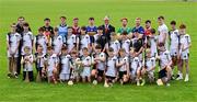 10 June 2025; Uachtarán Chumann Lúthchleas Gael Jarlath Burns with hurlers, from left, Billy Ryan of Kilkenny, Darragh Gray of Dublin, Fintan Burke of Galway, Jake Morris of Tipperary, Cian Lynch of Limerick, Podge Delaney of Laois, Niall O'Leary of Cork and Paul Dolan of Kildare and pupils from Scoil Phroinsiais Naofa, Clara, Offaly, with the Liam MacCarthy cup at the national launch of the GAA Hurling All-Ireland Senior Championship Series at the Faithful Fields in Kilcormac, Offaly. Photo by Brendan Moran/Sportsfile  Photo by Brendan Moran/Sportsfile