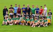10 June 2025; Uachtarán Chumann Lúthchleas Gael Jarlath Burns with hurlers, from left, Billy Ryan of Kilkenny, Darragh Gray of Dublin, Fintan Burke of Galway, Jake Morris of Tipperary, Cian Lynch of Limerick, Podge Delaney of Laois, Niall O'Leary of Cork and Paul Dolan of Kildare and pupils from St Brendan's Boys National School in Birr, Offaly, with the Liam MacCarthy cup at the national launch of the GAA Hurling All-Ireland Senior Championship Series at the Faithful Fields in Kilcormac, Offaly. Photo by Brendan Moran/Sportsfile