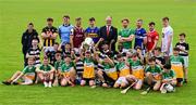 10 June 2025; Uachtarán Chumann Lúthchleas Gael Jarlath Burns with hurlers, from left, Billy Ryan of Kilkenny, Darragh Gray of Dublin, Fintan Burke of Galway, Jake Morris of Tipperary, Cian Lynch of Limerick, Podge Delaney of Laois, Niall O'Leary of Cork and Paul Dolan of Kildare and pupils from St Brendan's Boys National School in Birr, Offaly, with the Liam MacCarthy cup at the national launch of the GAA Hurling All-Ireland Senior Championship Series at the Faithful Fields in Kilcormac, Offaly. Photo by Brendan Moran/Sportsfile