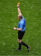 8 June 2025; Referee Johnny Murphy shows a yellow card during the Leinster GAA Senior Hurling Championship final match between Kilkenny and Galway at Croke Park in Dublin. Photo by Piaras Ó Mídheach/Sportsfile