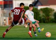 10 June 2025; Cathal O'Sullivan of Republic of Ireland in action against Mohamed Khaled A Gouda of Qatar during the U21 international friendly match between Qatar and Republic of Ireland at Gradski Stadion in Zagreb, Croatia. Photo by Gerry Scully/Sportsfile