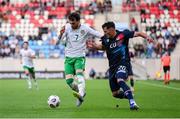 10 June 2025; Troy Parrott of Republic of Ireland in action against Eldin Dzogovic of Luxembourg during the international friendly match between Luxembourg and Republic of Ireland at Stade de Luxembourg in Luxembourg. Photo by Stephen McCarthy/Sportsfile