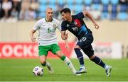 10 June 2025; Eldin Dzogovic of Luxembourg in action against Will Smallbone of Republic of Ireland during the international friendly match between Luxembourg and Republic of Ireland at Stade de Luxembourg in Luxembourg. Photo by Stephen McCarthy/Sportsfile