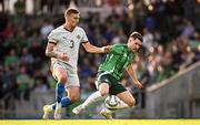 10 June 2025; Paul Smyth of Northern Ireland in action against Daníel Leó Grétarsson of Iceland during the International Friendly match between Northern Ireland and Iceland at Clearer Twist National Football Stadium at Windsor Park in Belfast. Photo by Ramsey Cardy/Sportsfile