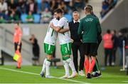 10 June 2025; Ryan Manning of Republic of Ireland is substituted on for teammate Robbie Brady during the international friendly match between Luxembourg and Republic of Ireland at Stade de Luxembourg in Luxembourg. Photo by Stephen McCarthy/Sportsfile
