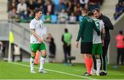 10 June 2025; Robbie Brady of Republic of Ireland makes his way off the pitch after sustaining an injury during the international friendly match between Luxembourg and Republic of Ireland at Stade de Luxembourg in Luxembourg. Photo by Stephen McCarthy/Sportsfile
