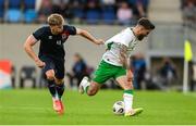 10 June 2025; Ryan Manning of Republic of Ireland in action against Florian Bohnert of Luxembourg during the international friendly match between Luxembourg and Republic of Ireland at Stade de Luxembourg in Luxembourg. Photo by Stephen McCarthy/Sportsfile