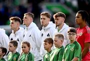 10 June 2025; Northern Ireland players, from right to left, Pierce Charles, Conor Bradley, Isaac Price, Daniel Ballard and Justin Devenny match before the International Friendly between Northern Ireland and Iceland at Clearer Twist National Football Stadium at Windsor Park in Belfast. Photo by Ramsey Cardy/Sportsfile
