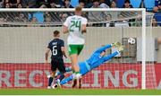 10 June 2025; Republic of Ireland goalkeeper Max O'Leary makes a save from Danel Sinani of Luxembourg, not pictured, during the international friendly match between Luxembourg and Republic of Ireland at Stade de Luxembourg in Luxembourg. Photo by Stephen McCarthy/Sportsfile