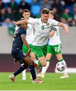 10 June 2025; Evan Ferguson of Republic of Ireland is tackled by Leandro Barreiro of Luxembourg during the international friendly match between Luxembourg and Republic of Ireland at Stade de Luxembourg in Luxembourg. Photo by Stephen McCarthy/Sportsfile