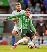 10 June 2025; Ronan Hale of Northern Ireland in action against Sverrir Ingason of Iceland during the International Friendly match between Northern Ireland and Iceland at Clearer Twist National Football Stadium at Windsor Park in Belfast. Photo by Ramsey Cardy/Sportsfile