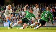 10 June 2025; Hákon Arnar Haraldsson of Iceland shoots under pressure from Daniel Ballard, left, and George Saville of Northern Ireland during the International Friendly match between Northern Ireland and Iceland at Clearer Twist National Football Stadium at Windsor Park in Belfast. Photo by Ramsey Cardy/Sportsfile