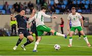 10 June 2025; Troy Parrott of Republic of Ireland in action against Seid Korac of Luxembourg during the international friendly match between Luxembourg and Republic of Ireland at Stade de Luxembourg in Luxembourg. Photo by Stephen McCarthy/Sportsfile
