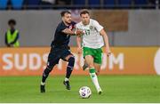 10 June 2025; Kasey McAteer of Republic of Ireland is tackled by Danel Sinani of Luxembourg tussle during the international friendly match between Luxembourg and Republic of Ireland at Stade de Luxembourg in Luxembourg. Photo by Stephen McCarthy/Sportsfile