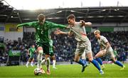 10 June 2025; Conor Bradley of Northern Ireland in action against Logi Tómasson of Iceland during the International Friendly match between Northern Ireland and Iceland at Clearer Twist National Football Stadium at Windsor Park in Belfast. Photo by Ramsey Cardy/Sportsfile
