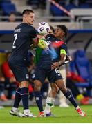 10 June 2025; Troy Parrott of Republic of Ireland in action against Seid Korac, left, and Leandro Barreiro of Luxembourg during the international friendly match between Luxembourg and Republic of Ireland at Stade de Luxembourg in Luxembourg. Photo by Stephen McCarthy/Sportsfile