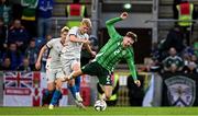 10 June 2025; Conor Bradley of Northern Ireland is fouled by Hákon Arnar Haraldsson of Iceland during the International Friendly match between Northern Ireland and Iceland at Clearer Twist National Football Stadium at Windsor Park in Belfast. Photo by Ramsey Cardy/Sportsfile