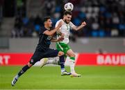 10 June 2025; Ryan Manning of Republic of Ireland in action against Eldin Dzogovic of Luxembourg during the international friendly match between Luxembourg and Republic of Ireland at Stade de Luxembourg in Luxembourg. Photo by Stephen McCarthy/Sportsfile
