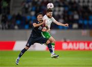10 June 2025; Ryan Manning of Republic of Ireland in action against Eldin Dzogovic of Luxembourg during the international friendly match between Luxembourg and Republic of Ireland at Stade de Luxembourg in Luxembourg. Photo by Stephen McCarthy/Sportsfile