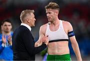 10 June 2025; Republic of Ireland head coach Heimir Hallgrimsson, left, with Nathan Collins of Republic of Ireland after the international friendly match between Luxembourg and Republic of Ireland at Stade de Luxembourg in Luxembourg. Photo by Stephen McCarthy/Sportsfile