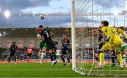 10 June 2025; Nathan Collins of Republic of Ireland has a header on goal under pressure from Seid Korac of Luxembourg during the international friendly match between Luxembourg and Republic of Ireland at Stade de Luxembourg in Luxembourg. Photo by Stephen McCarthy/Sportsfile