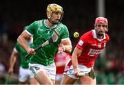 7 June 2025; Dan Morrissey of Limerick in action against Brian Hayes of Cork during the Munster GAA Hurling Senior Championship final match between Limerick and Cork at TUS Gaelic Grounds in Limerick. Photo by Piaras Ó Mídheach/Sportsfile