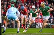 7 June 2025; Diarmuid Healy of Cork in action against Limerick players Kyle Hayes and Dan Morrissey, right, during the Munster GAA Hurling Senior Championship final match between Limerick and Cork at TUS Gaelic Grounds in Limerick. Photo by Piaras Ó Mídheach/Sportsfile
