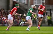 7 June 2025; Cian Lynch of Limerick in action against Cormac O'Brien of Cork during the Munster GAA Hurling Senior Championship final match between Limerick and Cork at TUS Gaelic Grounds in Limerick. Photo by Piaras Ó Mídheach/Sportsfile
