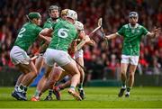 7 June 2025; Patrick Horgan of Cork is tackled by Limerick players, from left, Seán Finn, William O'Donoghue, Kyle Hayes, 6, and Dan Morrissey during the Munster GAA Hurling Senior Championship final match between Limerick and Cork at LIT Gaelic Grounds in Limerick. Photo by Piaras Ó Mídheach/Sportsfile