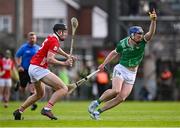 7 June 2025; Shane O'Brien of Limerick in action against Eoin Downey of Cork during the Munster GAA Hurling Senior Championship final match between Limerick and Cork at TUS Gaelic Grounds in Limerick. Photo by Piaras Ó Mídheach/Sportsfile