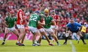 7 June 2025; Mark Coleman of Cork in action against Shane O'Brien of Limerick, 22, during the Munster GAA Hurling Senior Championship final match between Limerick and Cork at TUS Gaelic Grounds in Limerick. Photo by Piaras Ó Mídheach/Sportsfile