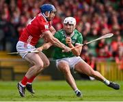 7 June 2025; Aaron Gillane of Limerick in action against Seán O'Donoghue of Cork during the Munster GAA Hurling Senior Championship final match between Limerick and Cork at TUS Gaelic Grounds in Limerick. Photo by Piaras Ó Mídheach/Sportsfile