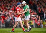 7 June 2025; Seán O'Donoghue of Cork and Aaron Gillane of Limerick during the Munster GAA Hurling Senior Championship final match between Limerick and Cork at TUS Gaelic Grounds in Limerick. Photo by Piaras Ó Mídheach/Sportsfile