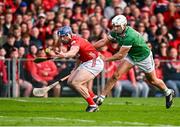 7 June 2025; Seán O'Donoghue of Cork in action against Aaron Gillane of Limerick during the Munster GAA Hurling Senior Championship final match between Limerick and Cork at TUS Gaelic Grounds in Limerick. Photo by Piaras Ó Mídheach/Sportsfile