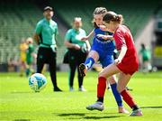 11 June 2025; Emily Redmond of Marshalstown NS, Wexford, in action against Éinín Nic Cumascaigh of Gaelscoil Uí Drisceoil, Corcaigh, during the FAI Primary 5s Finals Day at the Aviva Stadium in Dublin. Photo by Seb Daly/Sportsfile