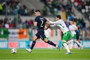 10 June 2025; Seid Korac of Luxembourg is tackled by Troy Parrott of Republic of Ireland during the international friendly match between Luxembourg and Republic of Ireland at Stade de Luxembourg in Luxembourg. Photo by Stephen McCarthy/Sportsfile