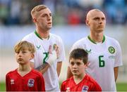 10 June 2025; Killian Phillips, left, and Will Smallbone of Republic of Ireland stand for the playing of the National Anthem before the international friendly match between Luxembourg and Republic of Ireland at Stade de Luxembourg in Luxembourg. Photo by Stephen McCarthy/Sportsfile