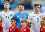 10 June 2025; Republic of Ireland players, from left, Nathan Collins, goalkeeper Max O'Leary and Evan Ferguson stand for the playing of the National Anthem before the international friendly match between Luxembourg and Republic of Ireland at Stade de Luxembourg in Luxembourg. Photo by Stephen McCarthy/Sportsfile