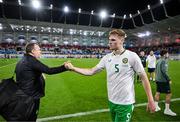 10 June 2025; Republic of Ireland's Jake O'Brien and kit and equipment manager Malcolm Slattery after the international friendly match between Luxembourg and Republic of Ireland at Stade de Luxembourg in Luxembourg. Photo by Stephen McCarthy/Sportsfile