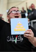 10 June 2025; A Republic of Ireland supporter holds a birthday card for head coach Heimir Hallgrimsson before the international friendly match between Luxembourg and Republic of Ireland at Stade de Luxembourg in Luxembourg. Photo by Stephen McCarthy/Sportsfile