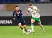 10 June 2025; Jack Taylor of Republic of Ireland in action against Vincent Thill of Luxembourg during the international friendly match between Luxembourg and Republic of Ireland at Stade de Luxembourg in Luxembourg. Photo by Stephen McCarthy/Sportsfile