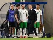 10 June 2025; Republic of Ireland's Matt Doherty and Adam Idah with coaches, from left, head of athletic performance Damien Doyle, assistant coach Paddy McCarthy and head coach Heimir Hallgrimsson during the international friendly match between Luxembourg and Republic of Ireland at Stade de Luxembourg in Luxembourg. Photo by Stephen McCarthy/Sportsfile
