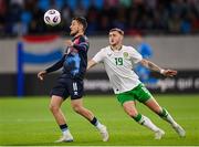 10 June 2025; Vincent Thill of Luxembourg in action against Jack Taylor of Republic of Ireland during the international friendly match between Luxembourg and Republic of Ireland at Stade de Luxembourg in Luxembourg. Photo by Stephen McCarthy/Sportsfile