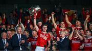 7 June 2025; Cork captain Robert Downey lifts the Mick Mackey Cup after his side' victory in the Munster GAA Hurling Senior Championship final match between Limerick and Cork at TUS Gaelic Grounds in Limerick. Photo by Piaras Ó Mídheach/Sportsfile
